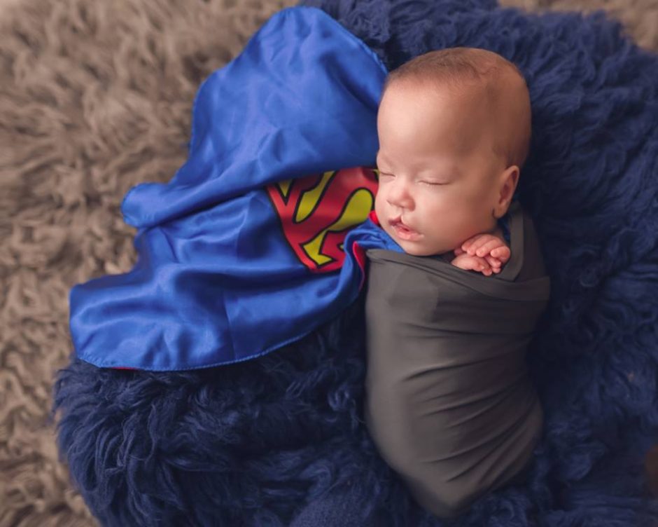 Baby with Superman cape